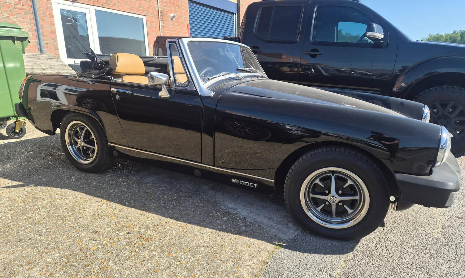 MG Midget Fully Restored Black convertible MG Midget with Cream Interior
